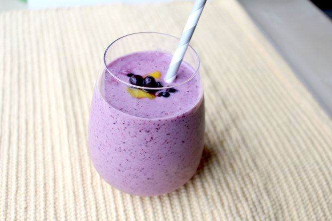 This blueberry mango smoothie is perfect for a quick refreshing meal, snack, or even dessert option.  It's so simple to make and is a great source of nutrients and protein! - by homemade nutrition - www.homemadenutrition.com