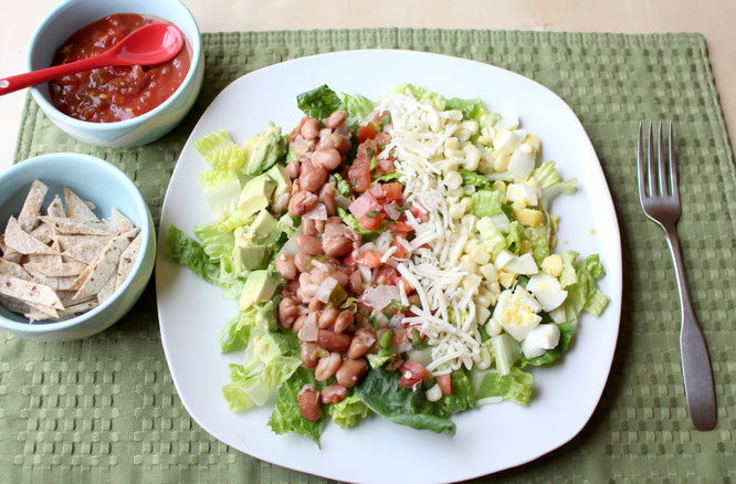 Avocado, cheese, pico de gallo, beans, corn, and hard boiled egg make this salad beautiful, flavorful, and healthy! - www.homemadenutrition.com