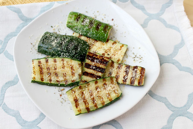 Grilled parmesan zucchini is one of the best ways to enjoy this delicious family-friendly veggie.  This recipe has only 5 main ingredients and comes together in minutes!  You can also use this several different ways.  www.homemadenutrition.com