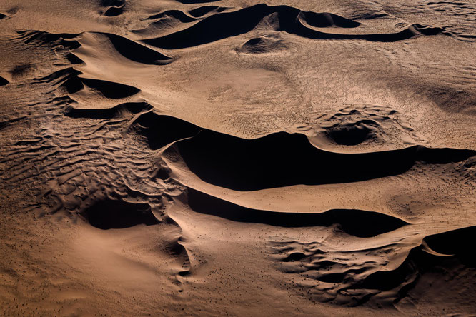 Red sand dunes in the areas of Sossusvlei - bird`s eye view, scenic flight - Namib Desert Namibia