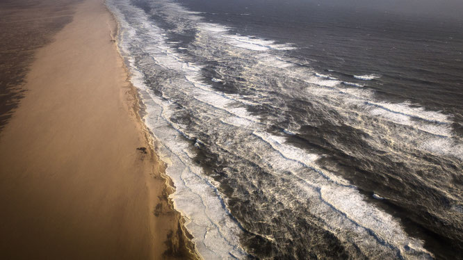 Bird`s eye view scenic flight - the long wall, Namib Desert meets the Atlantic Ocean, Namibia