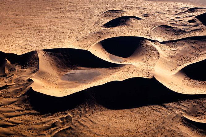 Red sand dunes in the areas of Sossusvlei - bird`s eye view, scenic flight  - Namib Desert Namibia