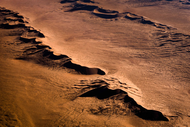 Red sand dunes in the areas of Sossusvlei - bird`s eye view, scenic flight - Namib Desert Namibia