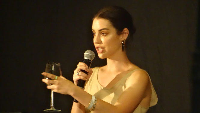 Adelaide Kane with wine at Wolfcon