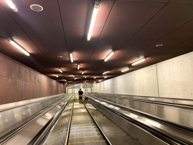 couple on escalators