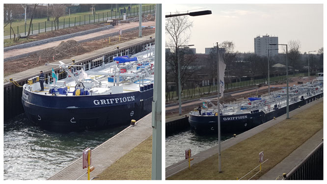 Ein Schiff in der Schleuse Griesheim in Frankfurt am Main