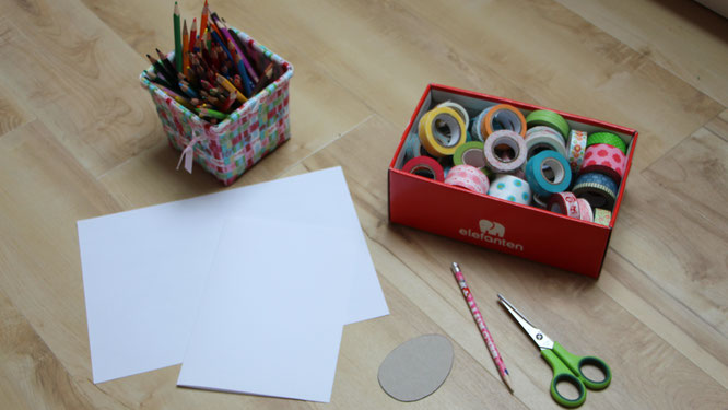 Die benötigten Materialien: Stifte, Tonkarton, Washi-Tapes, Schere