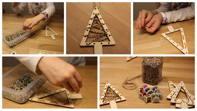 Unsere Große schmückt Holzweihnachtsbäume mit Glasperlen