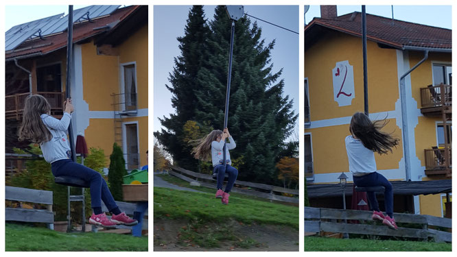 Unsere Kleine schwebt mit der Seilbahn den Hang hinab
