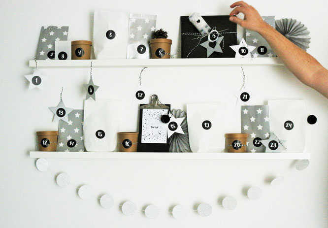 Bild: Diese DIY Adventskalender Idee für ihn mit Freebie Gutscheinen zum Ausdrucken und Verschenken, Adventskalender ganz schnell und einfach selber basteln; gefunden auf www.partystories.de mit Bastelutensilien von www.miomodo.de