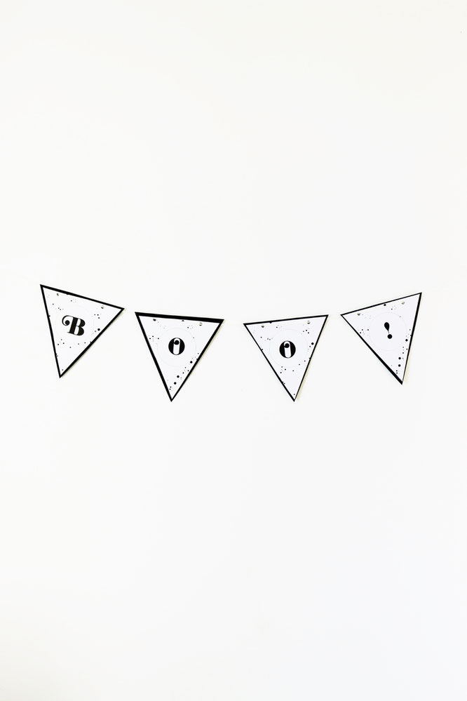 Bild: DIY Halloween Party Deko Ideen: Mit dieser Freebie Bastelvorlage Girlanden als Dekoration für Halloween & die Halloween Party einfach aus Papier selber machen! // Bastelvorlage & Anleitung von partystories.de // #halloween #halloweenparty #diydeko