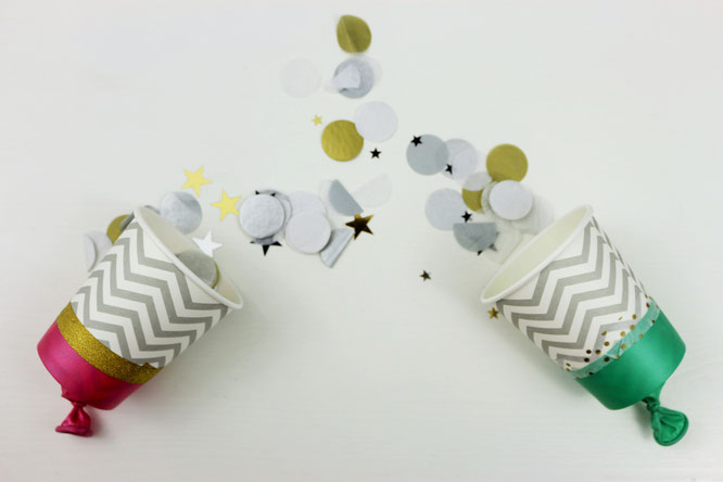 Bild: DIY Konfettikanonen aus Pappbechern - ganz einfach selbst gemacht, perfekt für die Hochzeit, Silvester oder als Konfetti Popper, gefunden auf Partystories.de