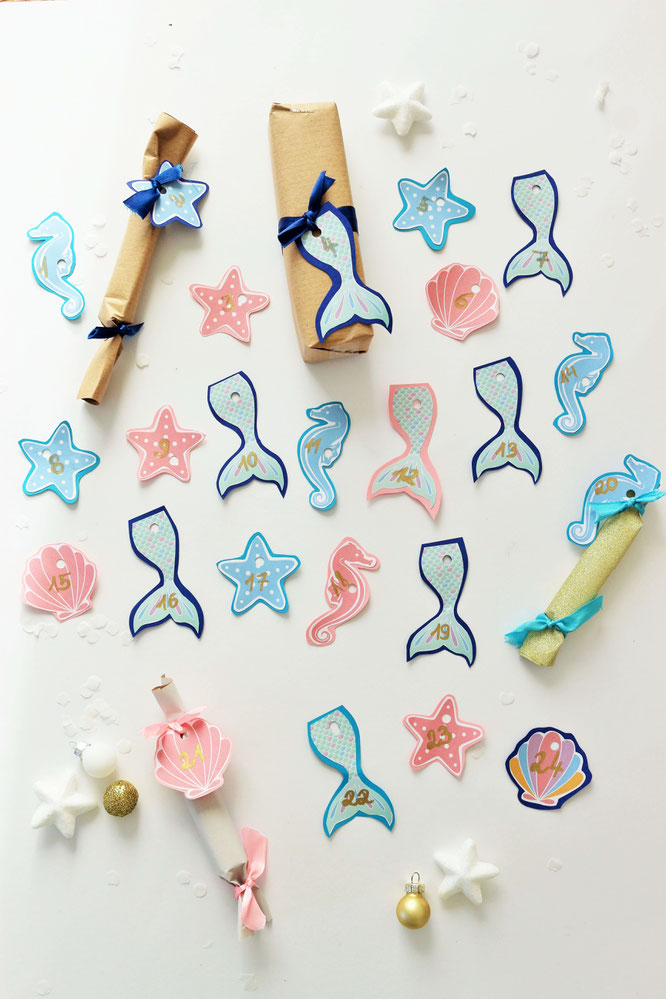 Bild: DIY Adventskalender für Kinder im Meerjungfrauen und Unter Wasser Stil basteln, Anleitung und Ideen zum Befüllen vom DIY Deko & Partystyling Blog Partystories.de // #Adventskalender #DIYadventskalender #Meerjungfrauen #Mermaid #unterWasser #basteln