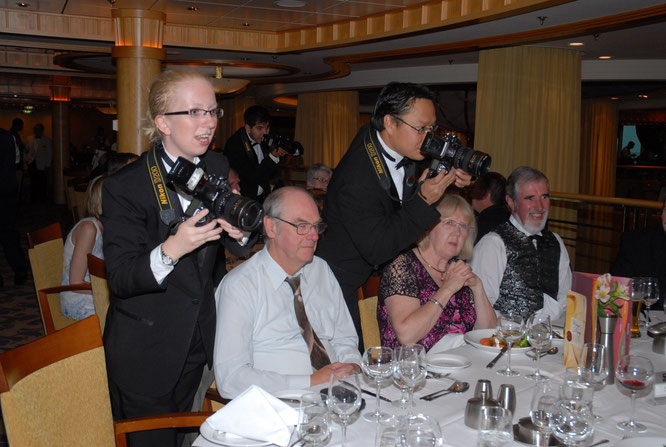 During formal night, shooting in a restaurant