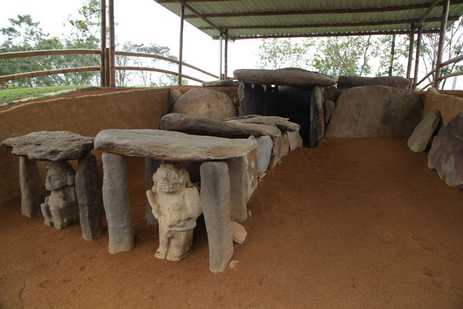 The statues, craved into volcanic stones, are protecting the entrance of the graves. This part was under the earth and was discovered by gold seekers.