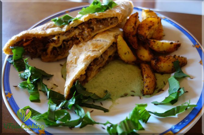 White Cabbage Strudel with Soy-Chips, Vegan Grated Cheese, Wild Garlic Sauße and Roast Potatoes