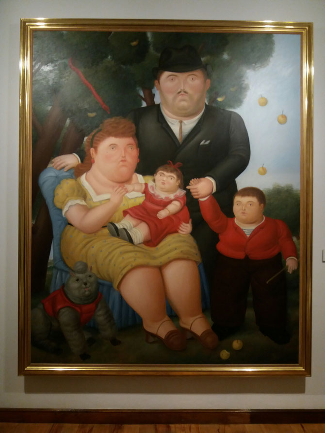 Die Familie. Die Schlange und die Äpfel bewegen sich und deuten auf eine Sünde hin, denn der Vater hat zwei Eheringe.
