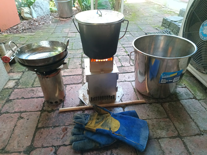 The ESS kernel: ss Kadhai wok on Permastove V4 (Left),  5L ss bucket boiling water on Flat Permastove V2 (Centre), 20L ss bucket for sanitation and potable water (Right)