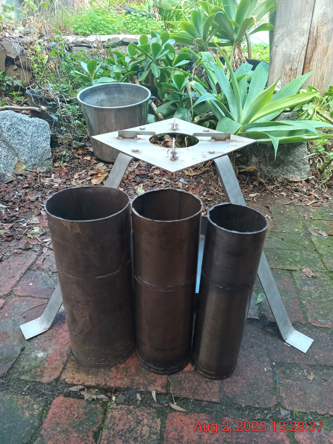 R to L (front): 4", 5" and 6" tube for the UPS (behind the tubes). Any tube can be selected for the desired flame size, temperature and burn time (also dependent on the mass of biomass pellets). This should cover every cooking and WASH situation. 