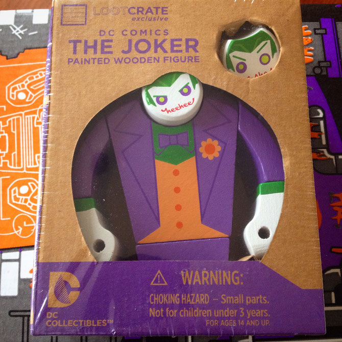 The Joker painted wooden figure, a LootCrate exclusive in August 2015.
