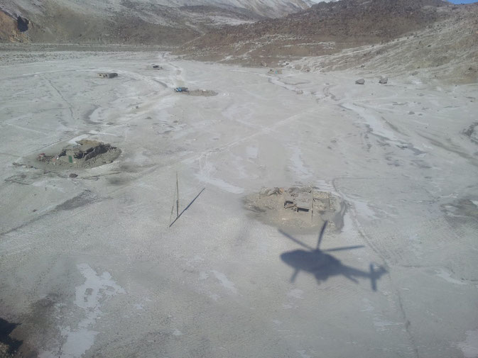 Ghudara -aerial shot of destroyed houses. Ghudare consists of more than 50 household which are widely. Earthquake, Pamir, Bartang, Tajikistan, Gorno-Badakhshan, GBAO dispersed on a plain.