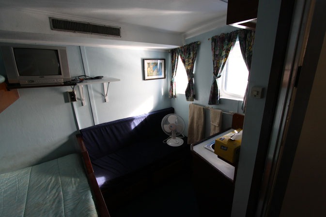 My cosy room minus all the junk thats now in it- scuba gear, hair bands, bikinis.