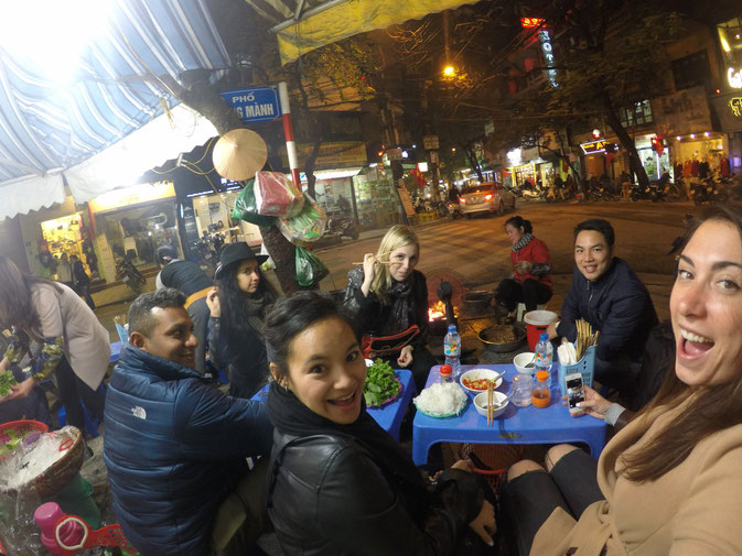 Mid bún cha selfies - you can see the lady in the back cooking the pork on coals