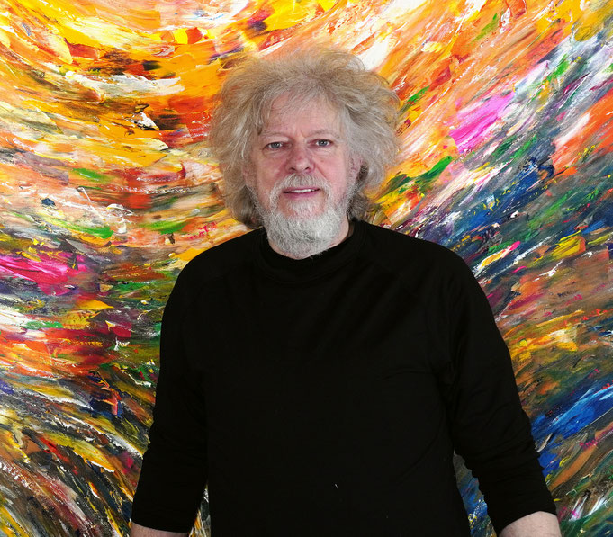 artist Peter Nottrott with his oversized painting Triptych: Positive Energy XXXL 2 on 10,8 sqm canvas