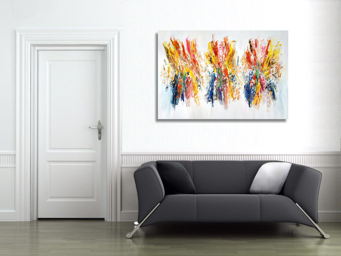 The finished painting hanging on the wall