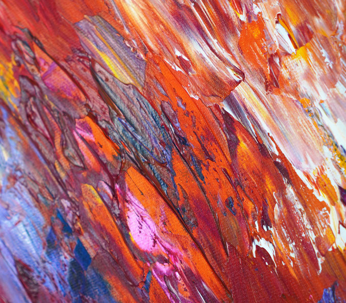 detail of the vibrant red abstract painting