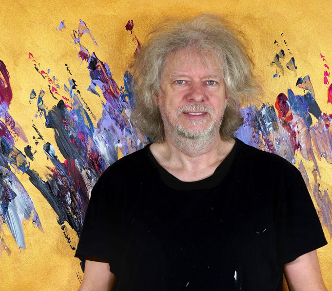 artist Peter Nottrott with his large abstract artwork Gold Abstraction L 1