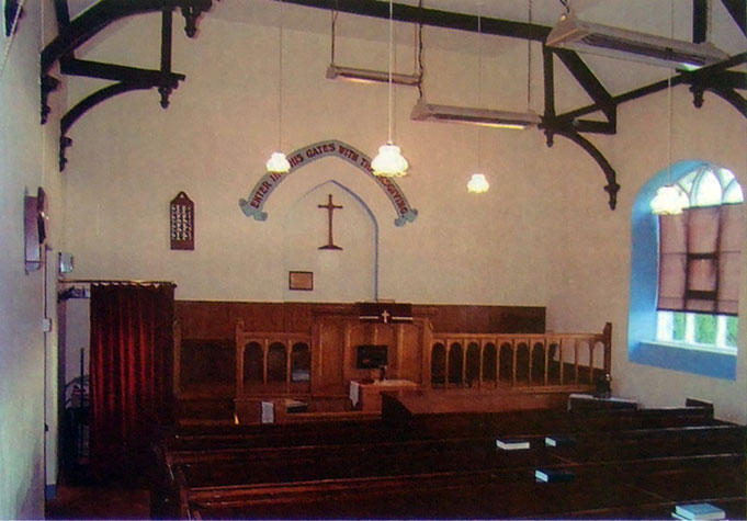 Interior of Chapel in 2006 showing the cross commissioned from David Lancaster in memory of Frank Daniel