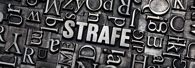Tasten für Schreibmaschine mit 'STRAFE' in der Mitte - Strafrecht Repräsentierung