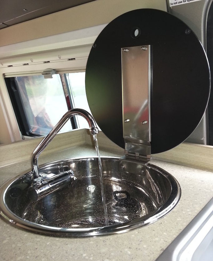 the sink has a fold down tap and is only 33cm in diameter - ideal for small campervans