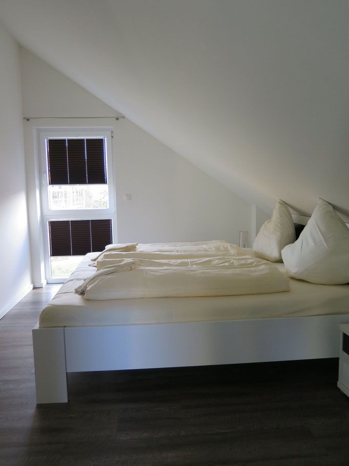 Schlafzimmer Doppelbett II_Ferienhaus Heiligenhafen Ostsee