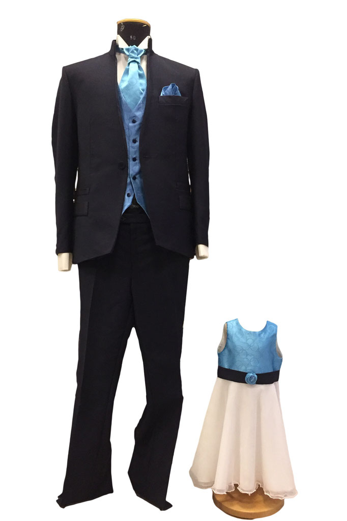 Hochzeitsanzug aus Wolle/Seide mit Stehkragen, Seidenweste und Jabot. Rechts: Kinderkleid aus Türkiser Jacquard-Seide und Seidenorganza