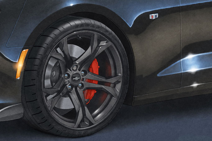 Sur les pneus, on peut y voir le lettrage Good Year Eagle Supercar F1. Ces pneus sont installés à l'usine