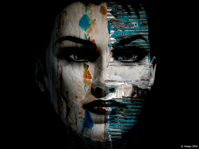 The white face behind the metal stripes