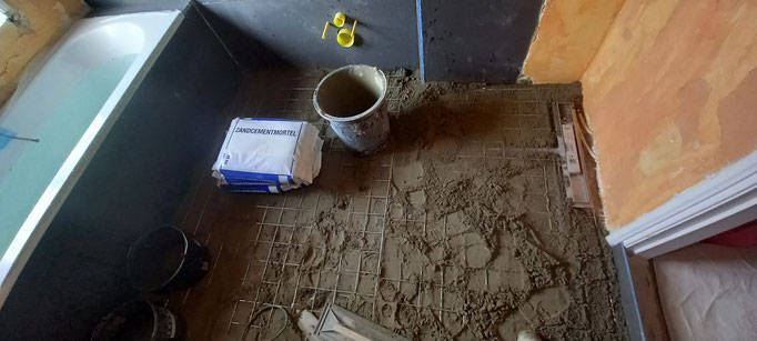 Start - cementdekvloer smeren met aardenet