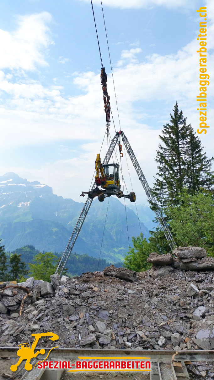 Spezialbaggerarbeit Adrian Krieg  Telefon 079 586 32 47 Gebirgsbau Bergbau alpiner Bau Hangsicherung Felsabbau Seilbahnfundamentbau Schneekanonenfundament Mastfundament Strasse Weg