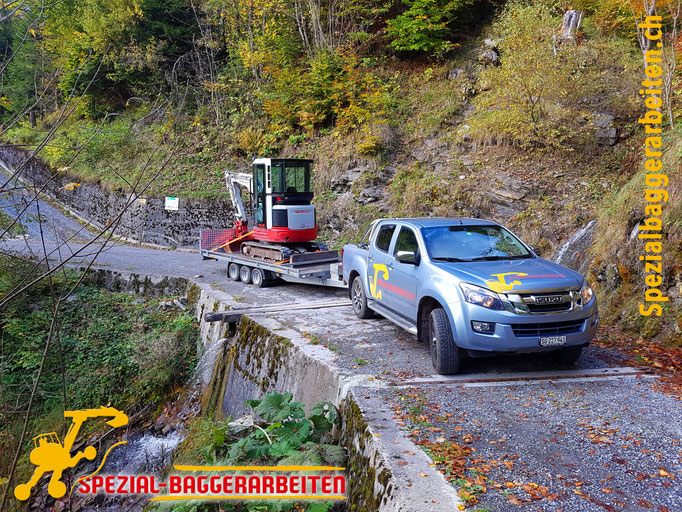 Spezialbaggerarbeit Adrian Krieg  Telefon 079 586 32 47 Gebirgsbau Bergbau alpiner Bau Hangsicherung Felsabbau Seilbahnfundamentbau Schneekanonenfundament Mastfundament Strasse Weg