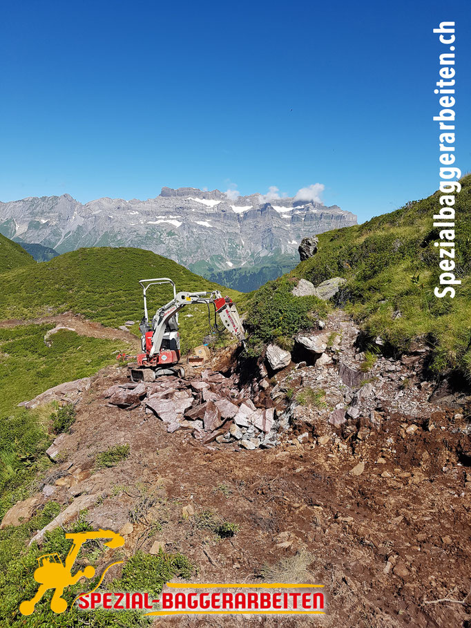 Spezialbaggerarbeit Adrian Krieg  Telefon 079 586 32 47 Gebirgsbau Bergbau alpiner Bau Hangsicherung Felsabbau Seilbahnfundamentbau Schneekanonenfundament Mastfundament Strasse Weg