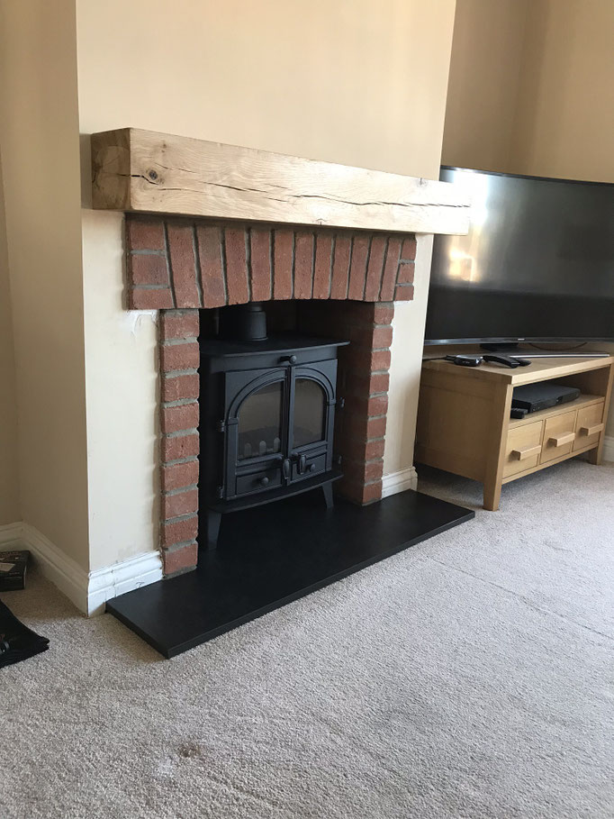 Durham Red Multi fireplace chamber with side returns and arched header