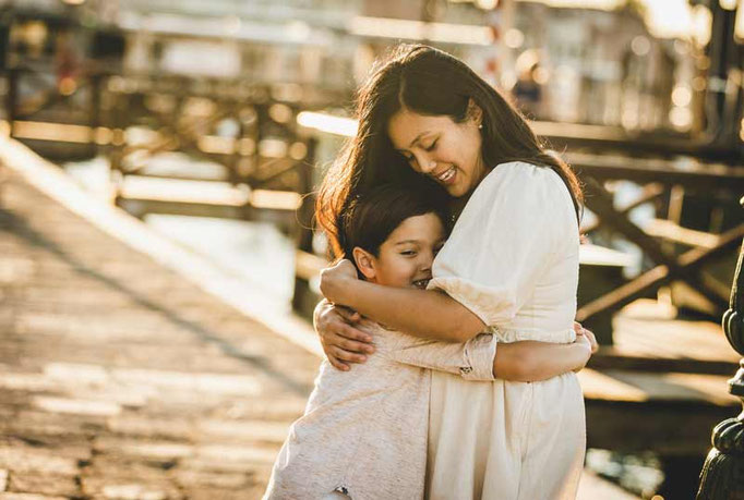 Venice family photographer captured spontaneous giggles and authentic expressions during their photoshoot.