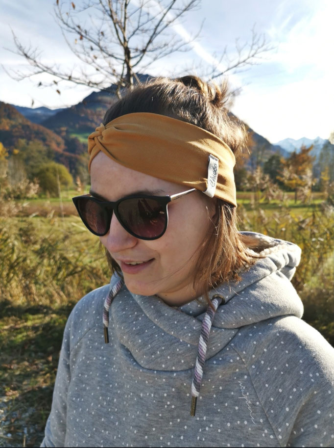 Knotenstirnband in Farbe senf