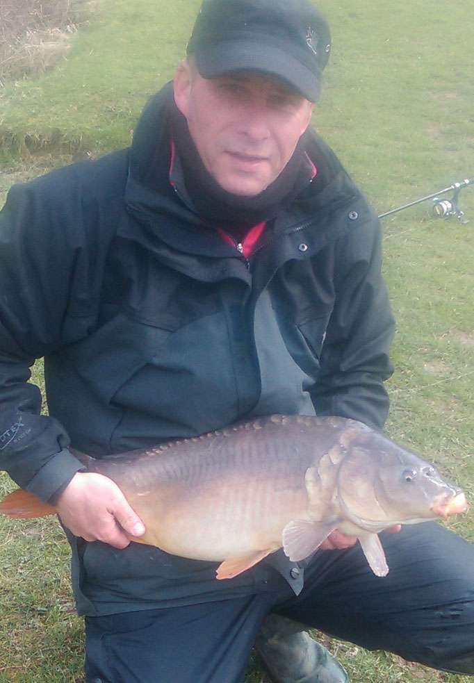 Andrew Grinham and a clonking 15lb 5oz mirror caught on surfaced fished bread