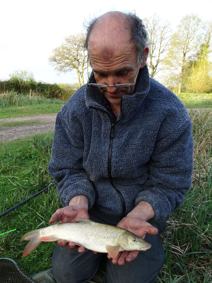 Keith and his first ever barbel, the first fish of the day caught in 30 seconds of the float hitting the water! 