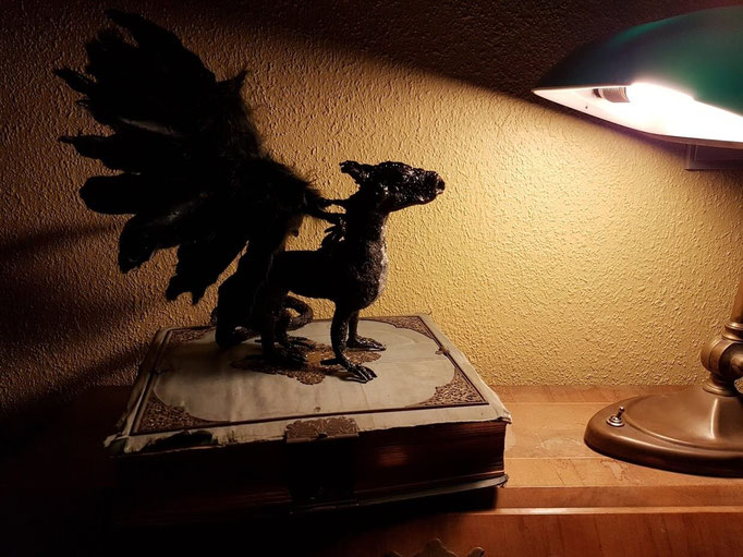 Drache mit Federn