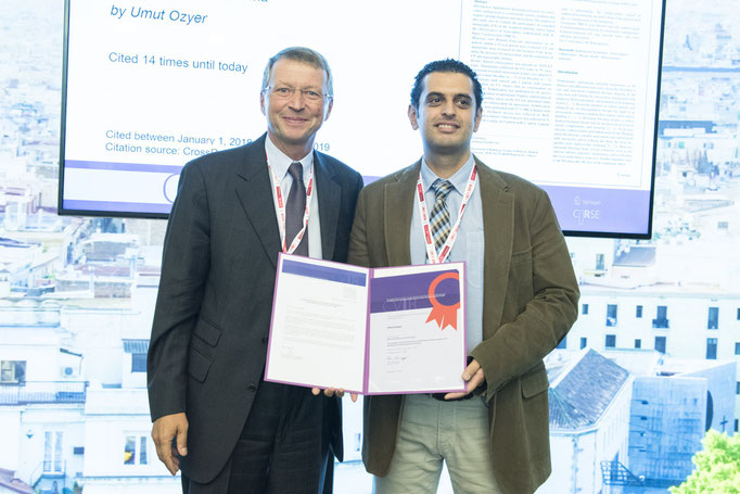  Most Cited Article: Scientific Paper, from left to right: K. Hausegger (CVIR EiC) and U. Ozyer (awardee)