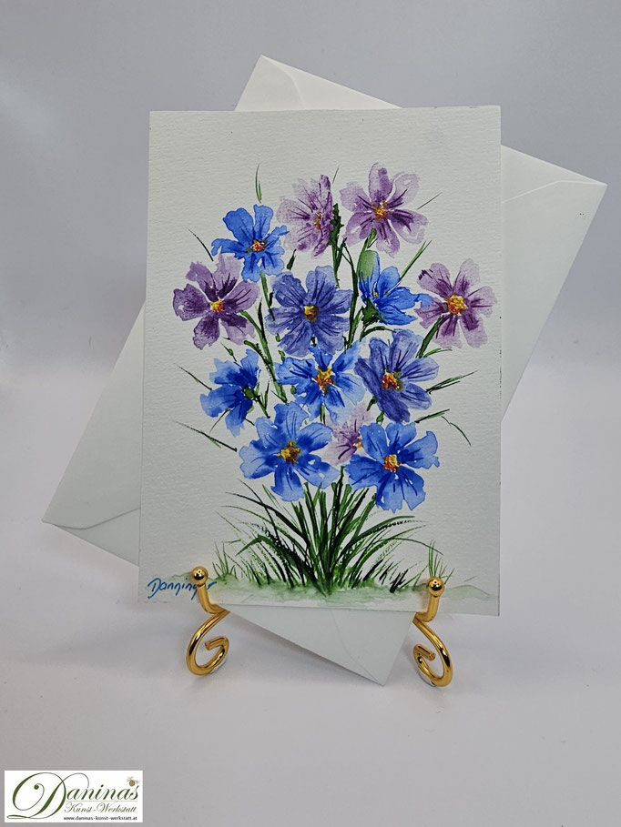 Geburtstagsgrußkarte mit Aquarellblumen in zarten Blautönen